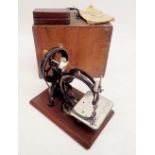 A Victorian Wilcox & Gibbs Automatic Silent sewing machine with box and instructions