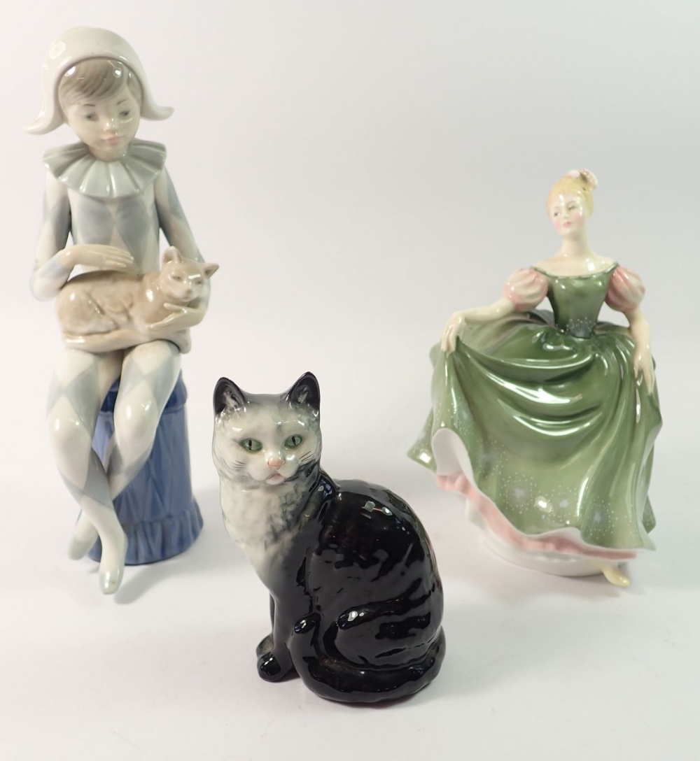A Beswick cat, Doulton figure and Nao figure