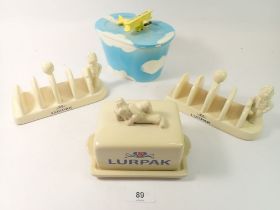 Two Lurpack toast racks and a butter dish plus Utterly Butterly butter dish