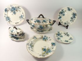 A Keeling & Co 'Trentham' dinner service painted blue flowers comprising eleven dinner plates,