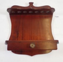 An Edwardian mahogany wall pipe rack and drawer, 29 x 25cm