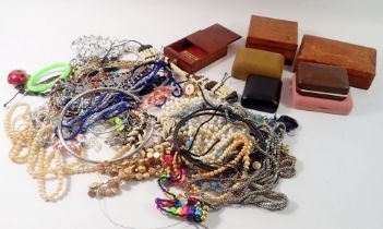 A group of costume jewellery necklaces and boxes