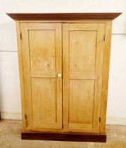 A Victorian pine two door cupboard, 168 x 128 x 48cm