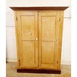 A Victorian pine two door cupboard, 168 x 128 x 48cm