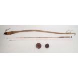 A two piece split cane fishing rod by Hamlin Cheltenham in brown cloth bag and two wooden fishing