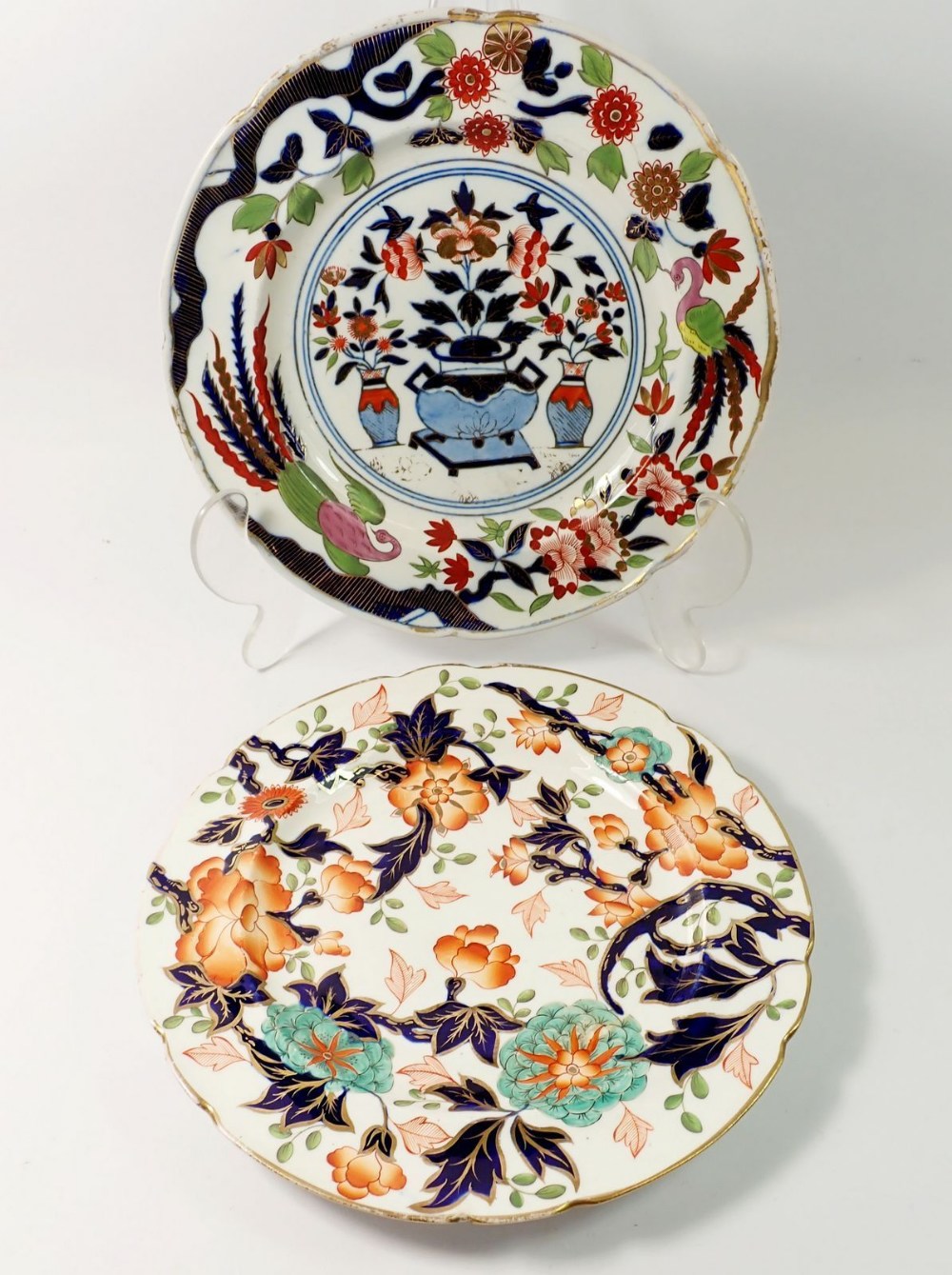 A Victorian plate painted flowers in Imari palette and an Ironstone plate painted in chinoiserie