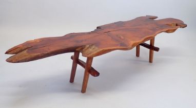 A rustic yew wood plank top live edge coffee table enscribed "Hand Made Hugo Mason', 164 x 43 x 38cm