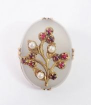 A gold mounted white onyx brooch set floral spray of garnets and seed pearls, 2.7 x 2cm