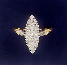 A French 18 carat gold ring of marquise form set small diamonds, 2.6g, size M