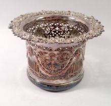 A 19th century silver plated bottle coaster with pierced decoration