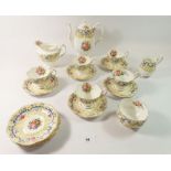 A Royal Albert Valentine tea service comprising teapot, five cups and nine saucers, cream jug,