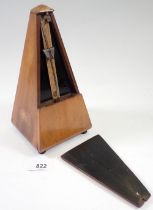 A metronome in mahogany case