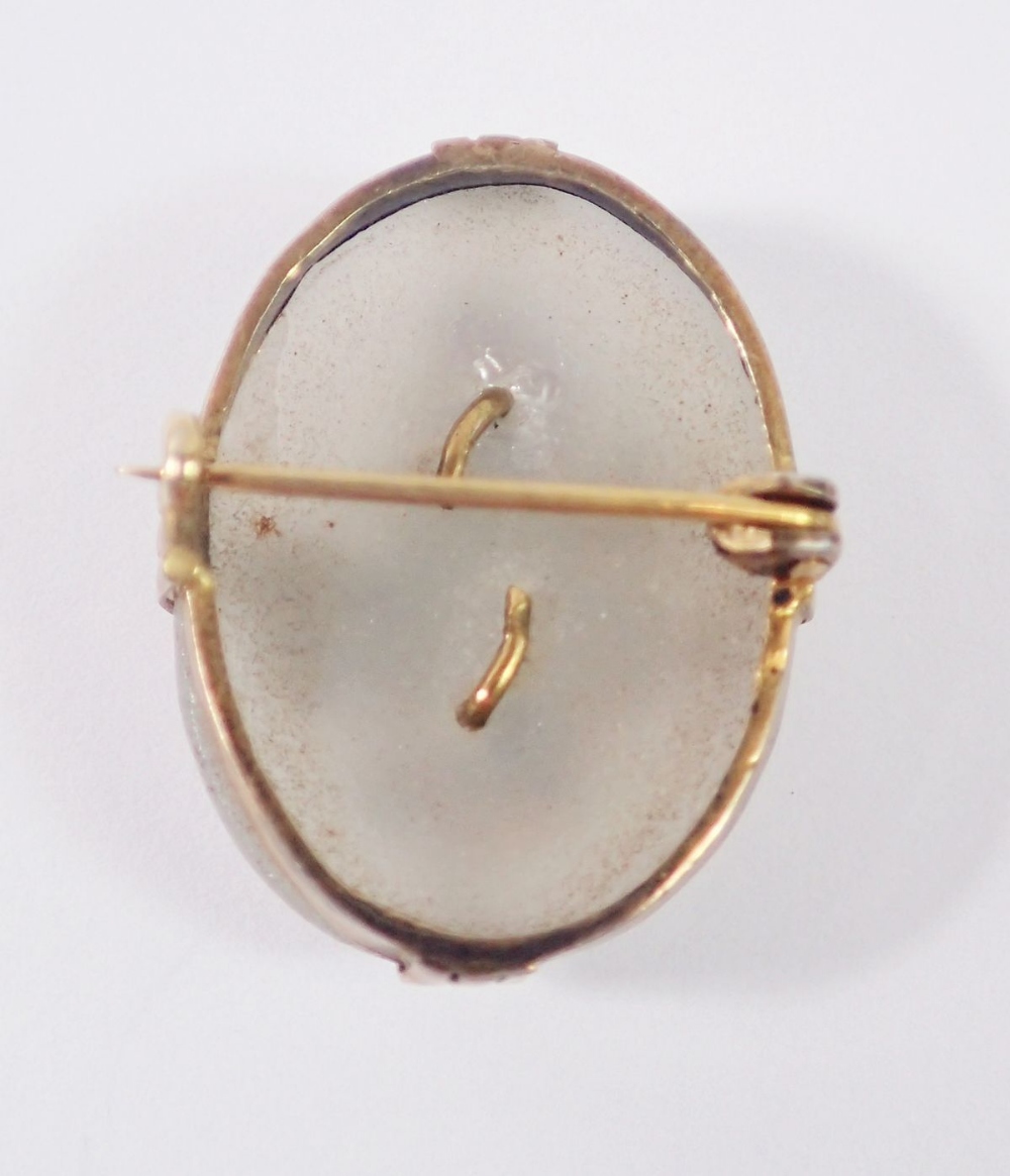 A gold mounted white onyx brooch set floral spray of garnets and seed pearls, 2.7 x 2cm - Image 2 of 2