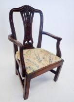 A 19th century Hepplewhite style child's chair