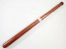 A long wooden truncheon, 65cm long