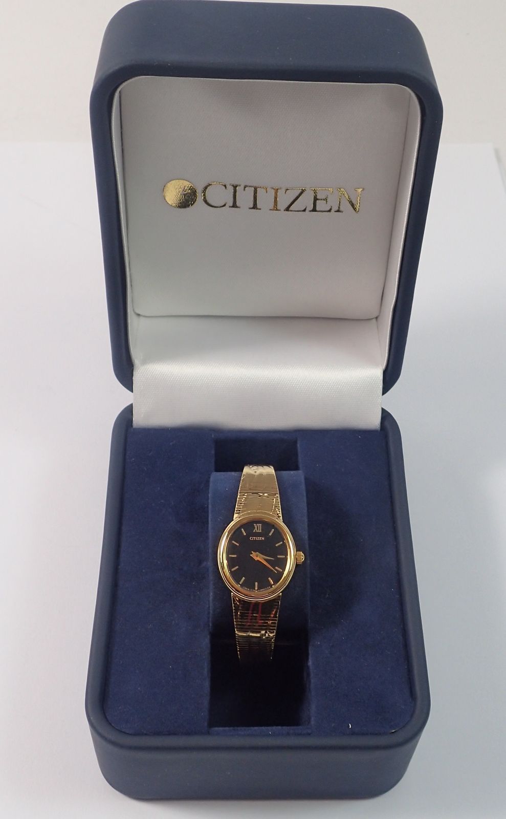 A Citizen ladies gold plated quartz watch, boxed