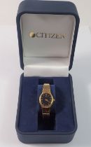 A Citizen ladies gold plated quartz watch, boxed