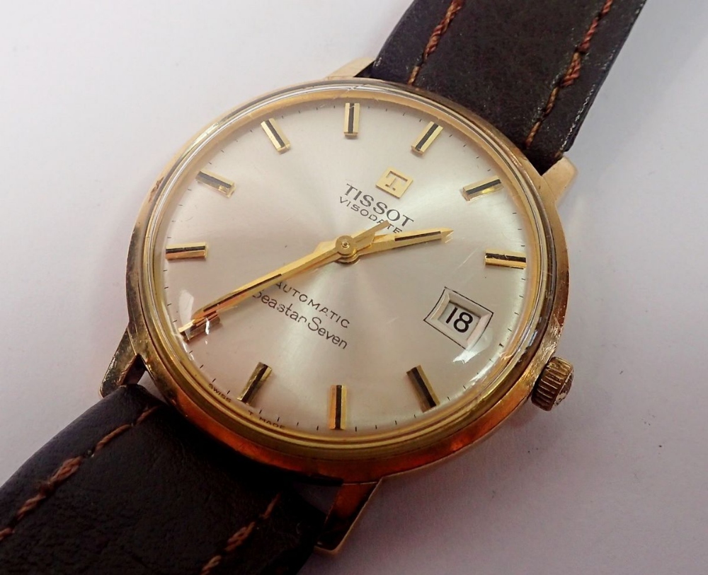A Tissot Seastar Seven 9 carat gold automatic watch