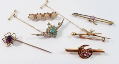 A selection of gold bar brooches and spider stick pin