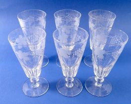 A set of six facet cut wine glasses etched vines