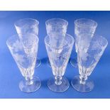 A set of six facet cut wine glasses etched vines