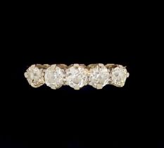 An 18 carat gold five stone diamond ring, boxed, size O-P, 3g