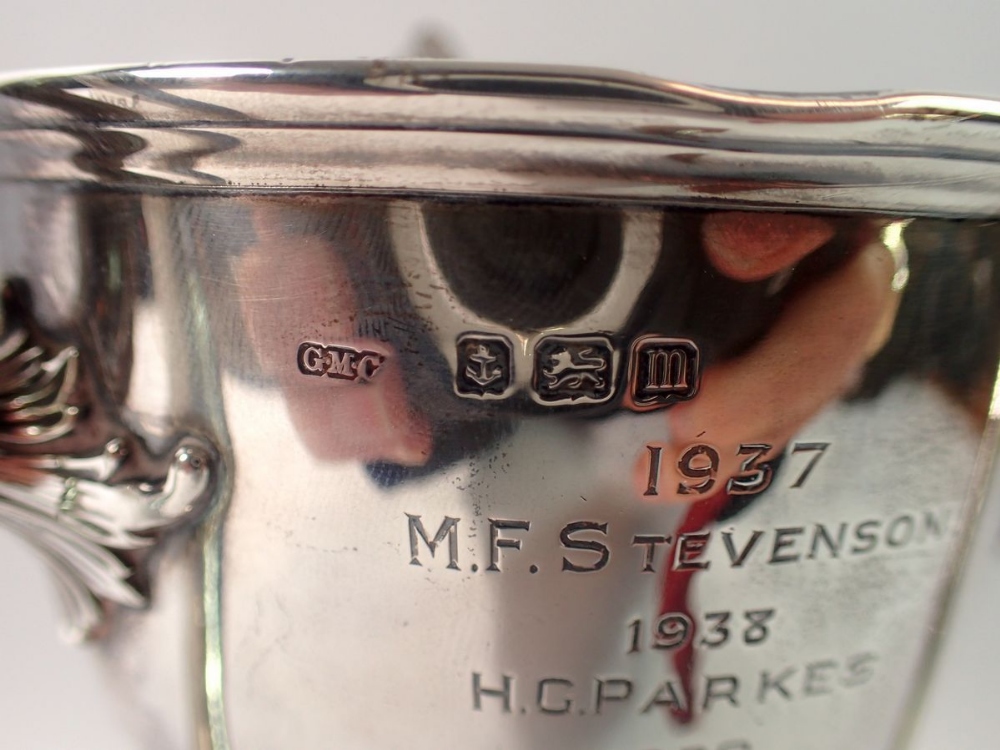 A silver three handled Art Nouveau trophy cup, 'Kingsland Grand Gymnasium Cup', engraved names, - Image 4 of 5