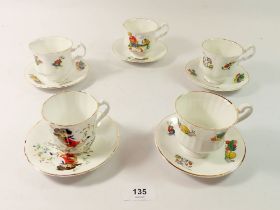 A group of five vintage children's nursery cups