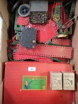 A box of old Meccano including 'Accessory outfit 5A & 6A' and various other parts and accessories