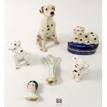 A group of dalmatian ornaments, an Art Deco pin dolly and a Victorian porcelain dolls shoulder head,