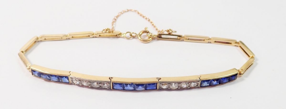 An 18 ct gold bracelet line set alternate links of brilliant cut diamonds and square cut - Image 2 of 3