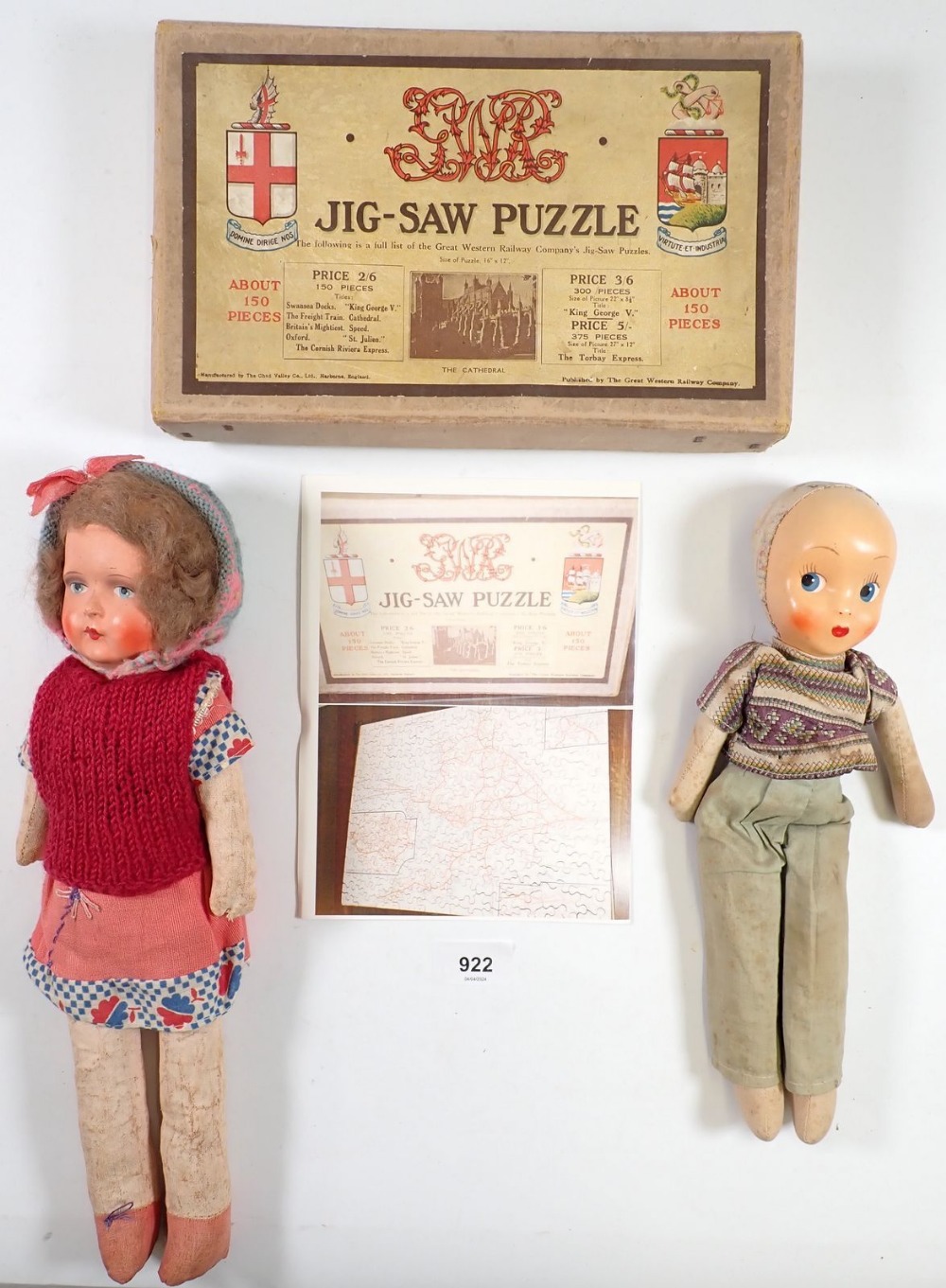 Two vintage papier mache faced dolls with fabric bodies and a GWR jigsaw puzzle