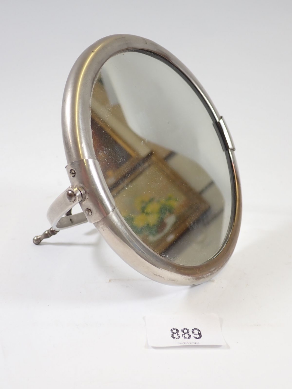 An Edwardian circular plated gentlemen's easel mirror in leather case and photograph frame - Image 3 of 4