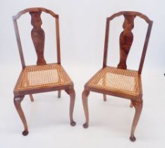 A pair of walnut cane seated bedroom chairs