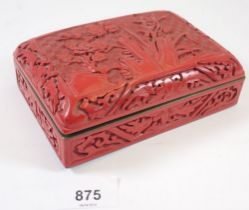 A Chinese cinnabar lacquer cigarette box