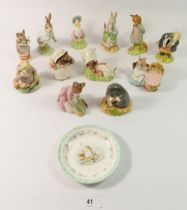 A group of Royal Albert Beatrix Potter figures including Peter Rabbit, Jeremy Fisher, Tommy Brock