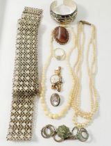 A silver lion mask bracelet, an Ebel ladies vintage watch and various costume jewellery