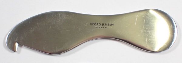 A Georg Jensen orange/citrus peeler in stainless steel, 10cm