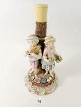 A Sitzendorf porcelain centrepiece stem group of two children, 25cm