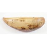 A whales tooth scrimshaw, 11.5cm long