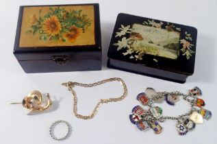A 9 carat gold bracelet, 3.5g, a white metal and silver enamel charm bracelet and two lacquer boxes