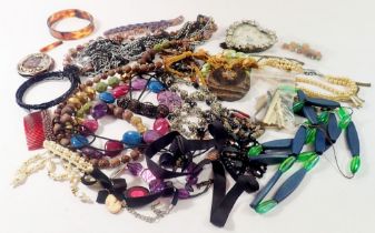 A box of beads and costume jewellery