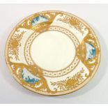 A Minton plate with three pate sur pate panels with gilt shell and leaf decoration, cracked and