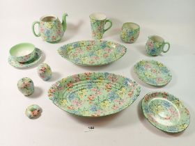 A Shelley Melody group comprising two oval dishes, coffee mug, two saucers, pepper and a pin dish (