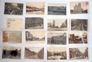 An album of topographical postcards including London, Brighton, Leeds & Worcestershire and three