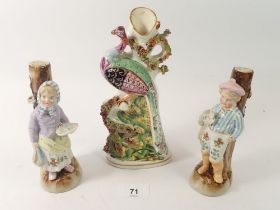 A pair of 19th century porcelain figures of a boy and girl, 15cm and a Staffordshire Peacock - a/f