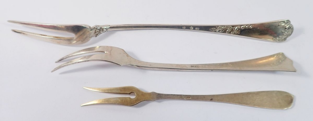 Two continental silver pickle forks and a Russian one, 74g - Image 2 of 2