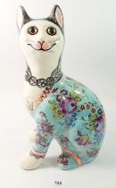 A Griselda Hill Wemyss cat with floral chintz decoration, 33.5cm