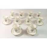 A set of ten Royal Worcester Irish Whisky cups and saucers printed flowers