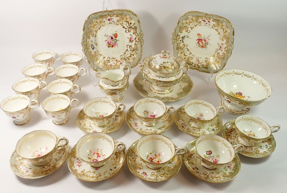 A Rockingham tea service comprising eight tea cups, eight coffee cups, eight saucers, slop bowl,